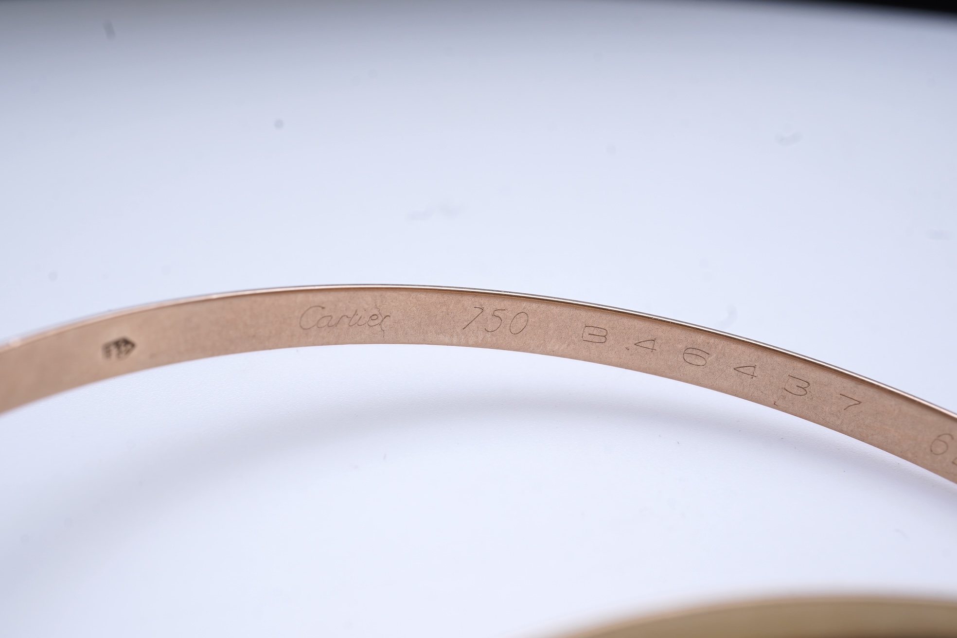 Cartier, a gold bangle, 'Trinity de Cartier'